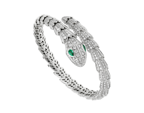 Serpenti 18 kt white gold bracelet set with pavé diamonds and two emerald eyes.